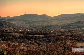 Somewhere behind Aisimi, in the windgenerators.